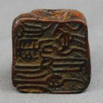 Antiker feinst geschnitzter Stempel / Seal in Bernstein