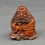 Antiker fein geschnitzter Buddha der langen Augenbrauen