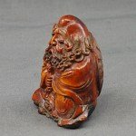 Antiker fein geschnitzter Buddha der langen Augenbrauen