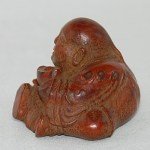 Antiker kleiner Buddha / Boy in Bambus