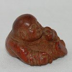 Antiker kleiner Buddha / Boy in Bambus