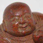 Antiker kleiner Buddha / Boy in Bambus