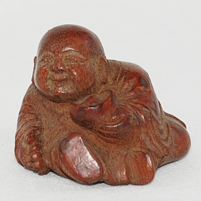 Antiker kleiner Buddha / Boy in Bambus
